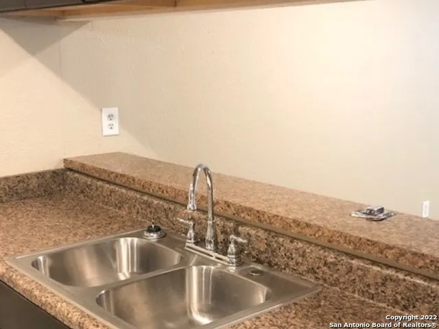a close view of a sink and faucet