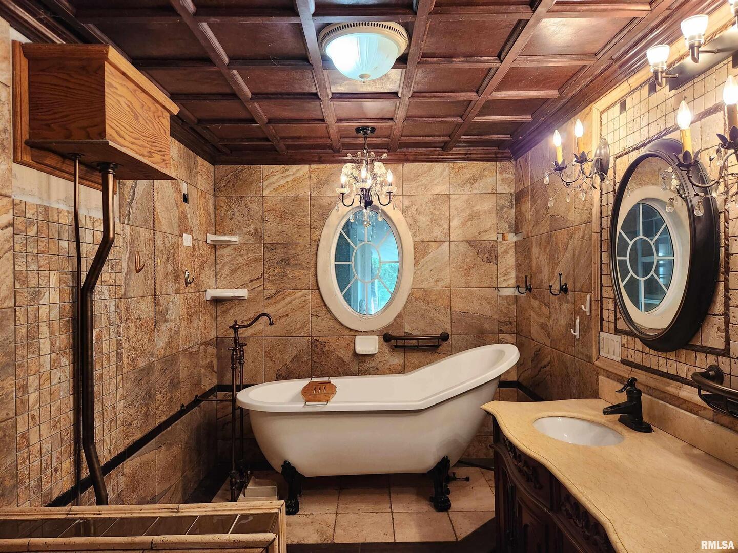 5628 Coal Street Sesser, IL 62884 - Photo 18 of 62 a bathroom with a toilet a sink and mirror