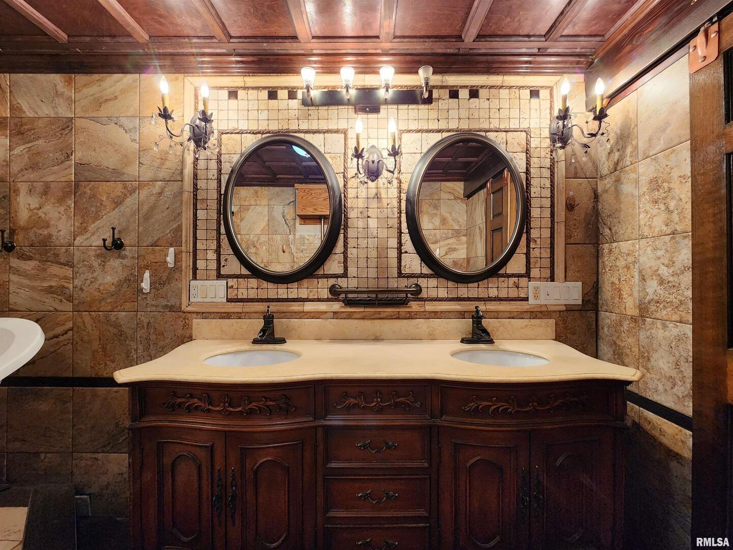 5628 Coal Street Sesser, IL 62884 - Photo 20 of 62 a bathroom with a sink and a mirror