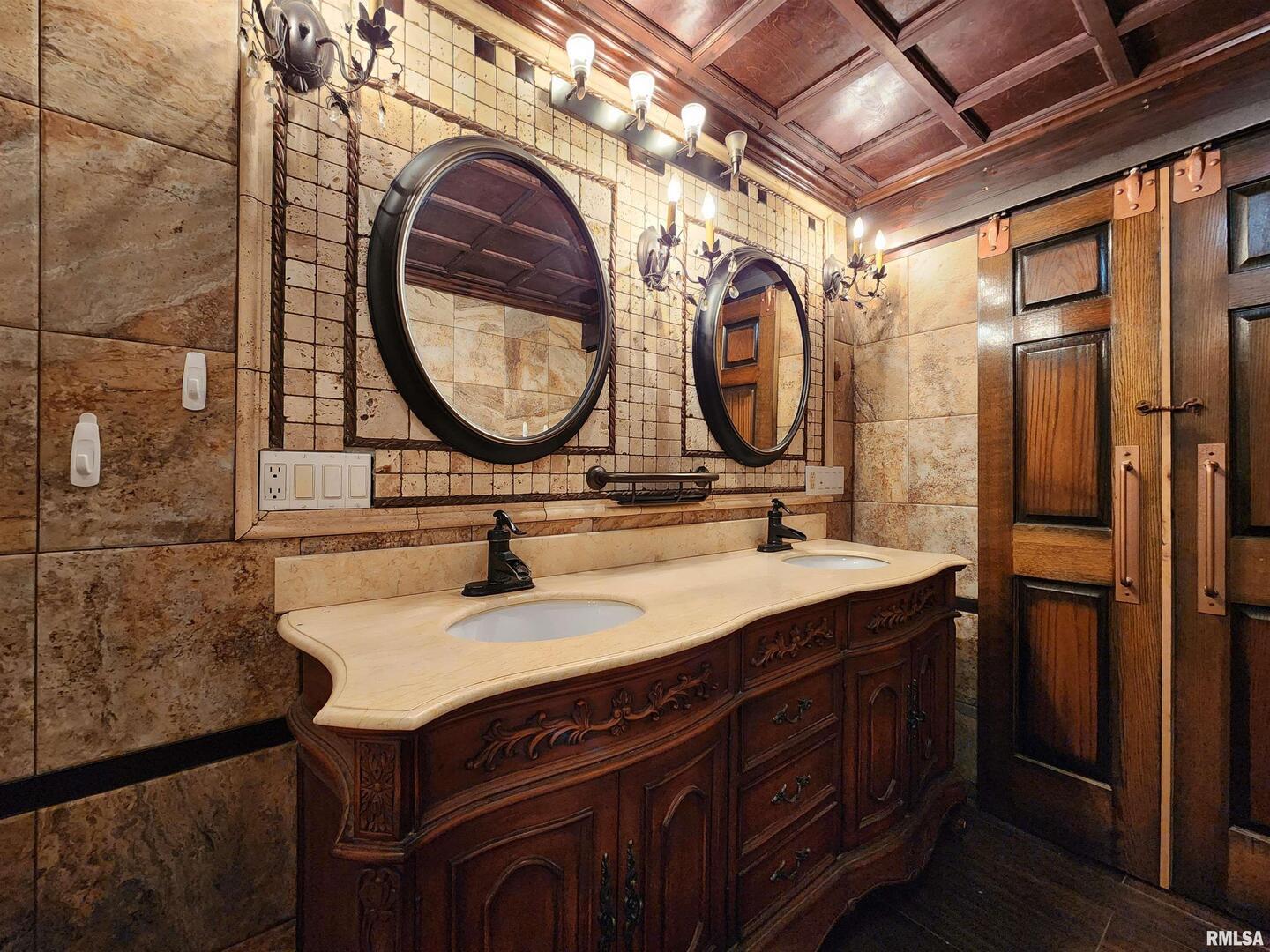 5628 Coal Street Sesser, IL 62884 - Photo 21 of 62 a bathroom with a sink and a mirror
