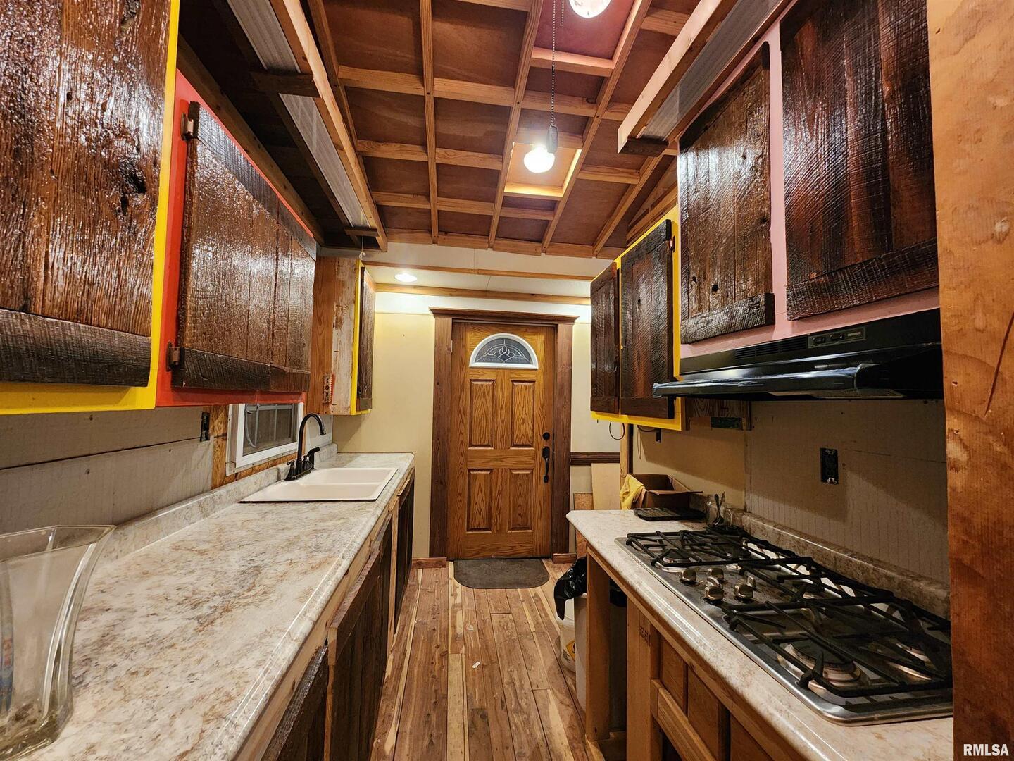 5628 Coal Street Sesser, IL 62884 - Photo 31 of 62 a kitchen with stainless steel appliances granite countertop a stove and a refrigerator