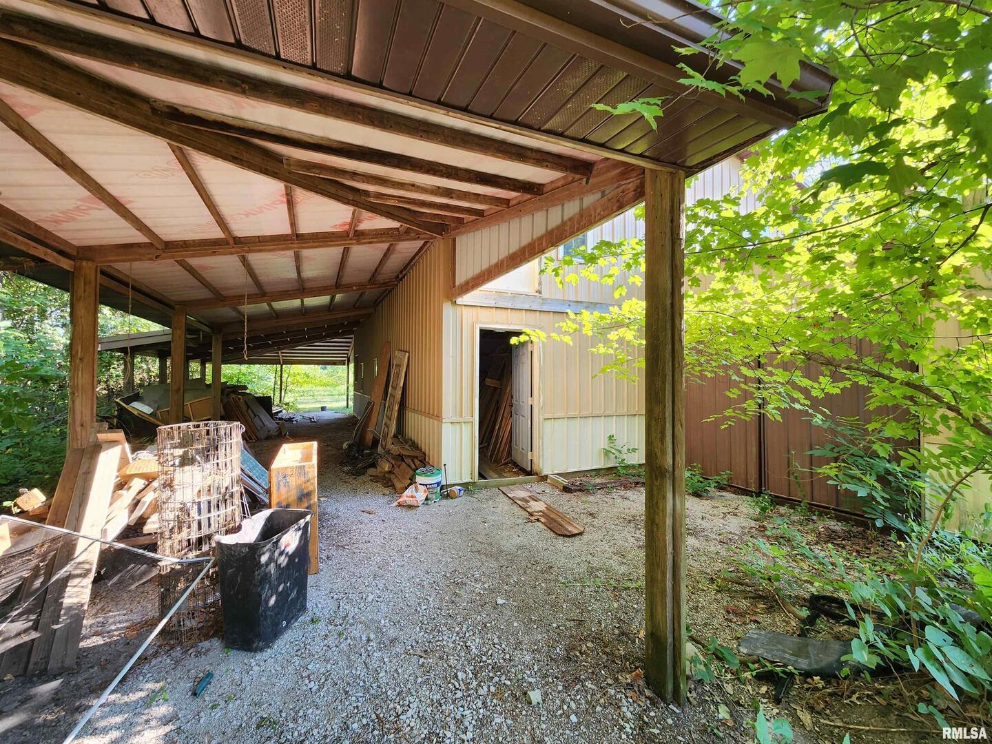 5628 Coal Street Sesser, IL 62884 - Photo 51 of 62 a view of a porch with furniture and backyard