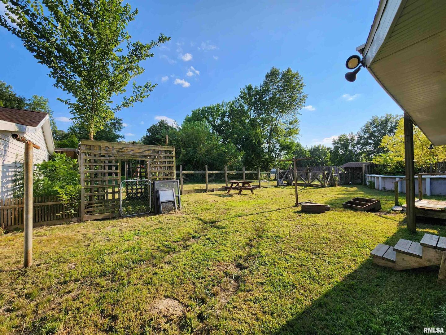 5628 Coal Street Sesser, IL 62884 - Photo 59 of 62 a view of a swimming pool with a patio