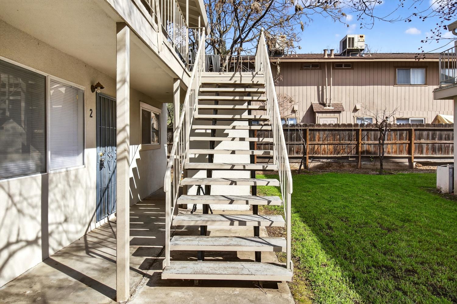 1962 Edwards Avenue Merced, CA 95340 - Photo 13 of 22 front view of a house with a yard