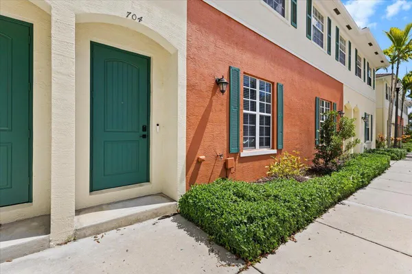 a kitchen with a table and chairs