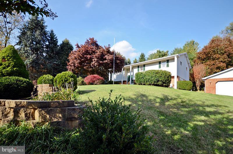 3211 Hunt Road Fallston, MD 21047 - Photo 2 of 25 a view of a garden with a fountain