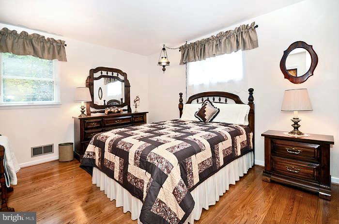 3211 Hunt Road Fallston, MD 21047 - Photo 14 of 25 a bedroom with bed and a window
