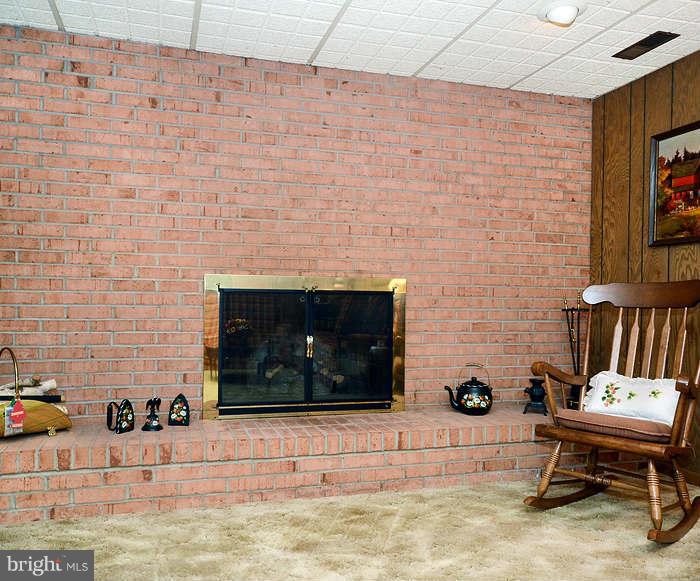 3211 Hunt Road Fallston, MD 21047 - Photo 17 of 25 a living room with a couch and a rug