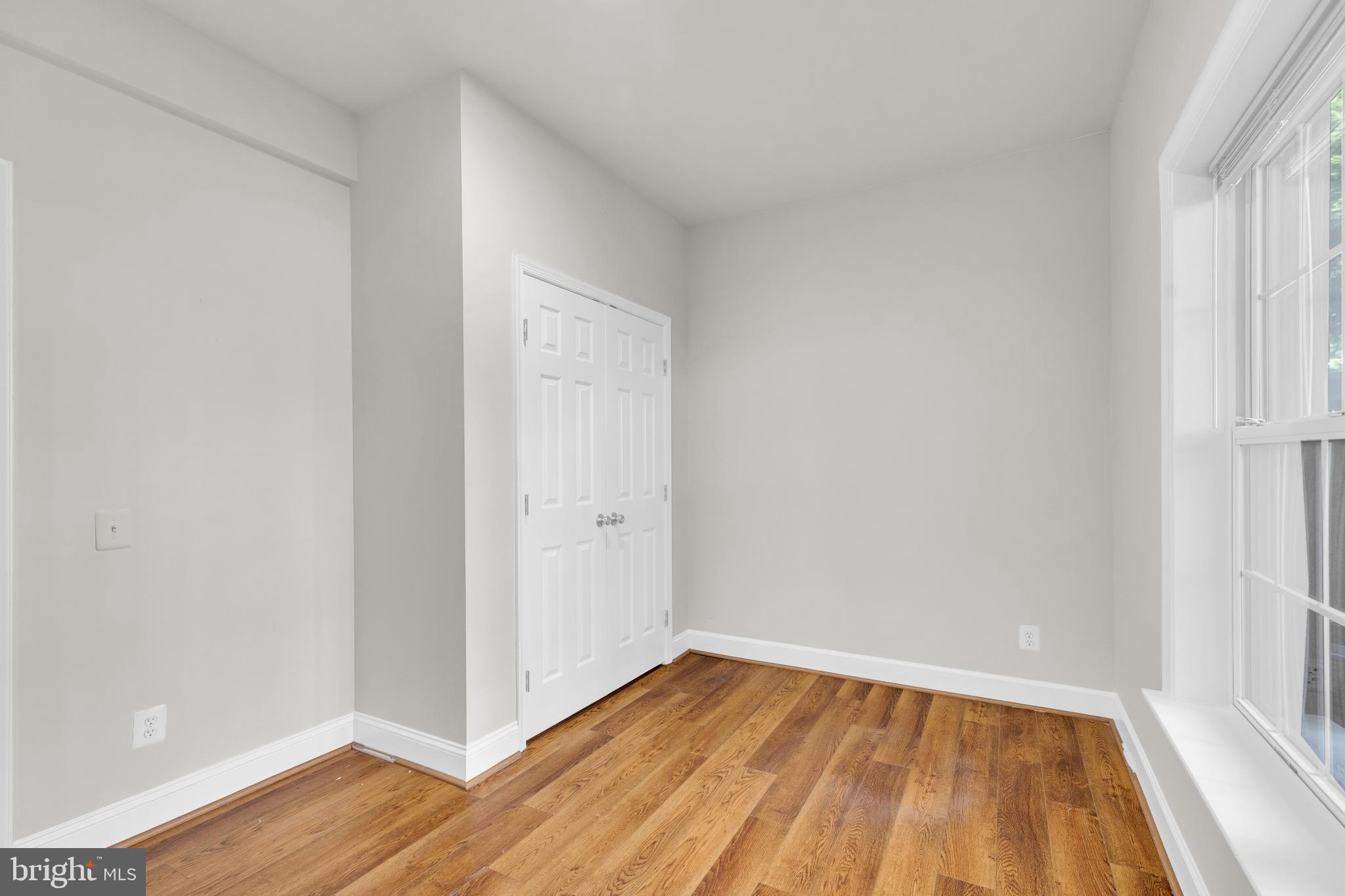 9249 Laurel Ridge Crossing Road Lorton, VA 22079 - Photo 21 of 38 a view of wooden floor in a room