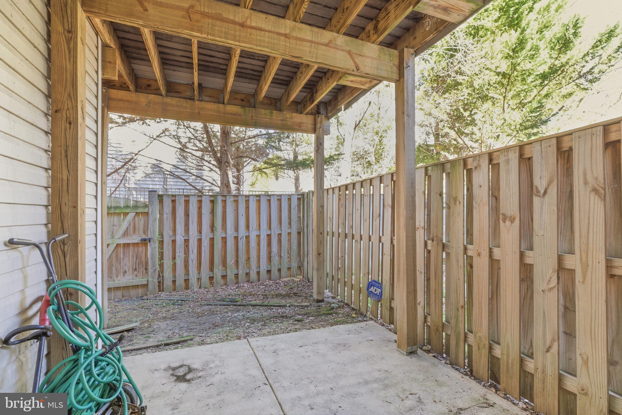 9249 Laurel Ridge Crossing Road Lorton, VA 22079 - Photo 38 of 38 a view of a backyard with wooden fence
