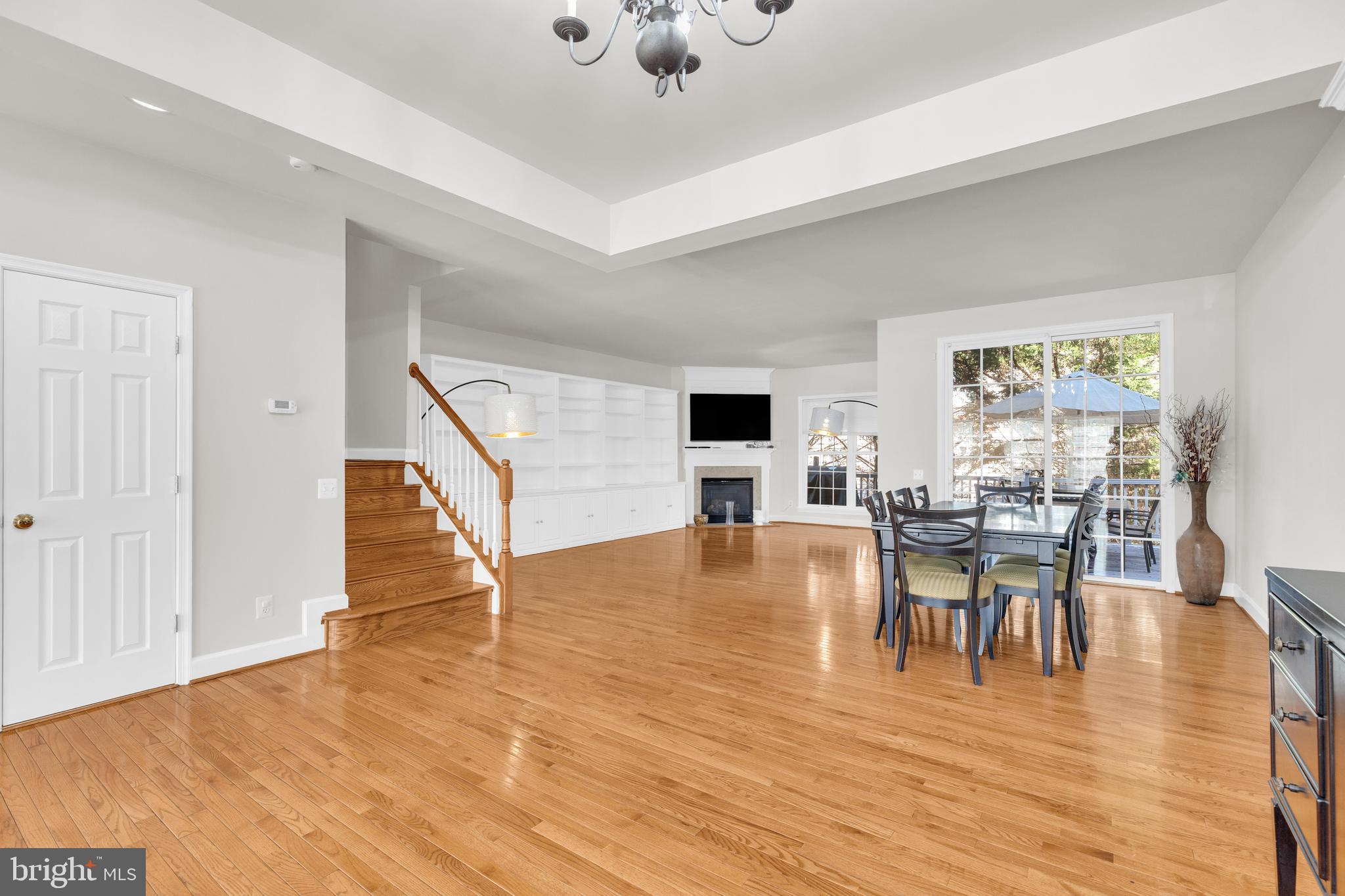 9249 Laurel Ridge Crossing Road Lorton, VA 22079 - Photo 7 of 38 a view of a dining room with furniture and wooden floor