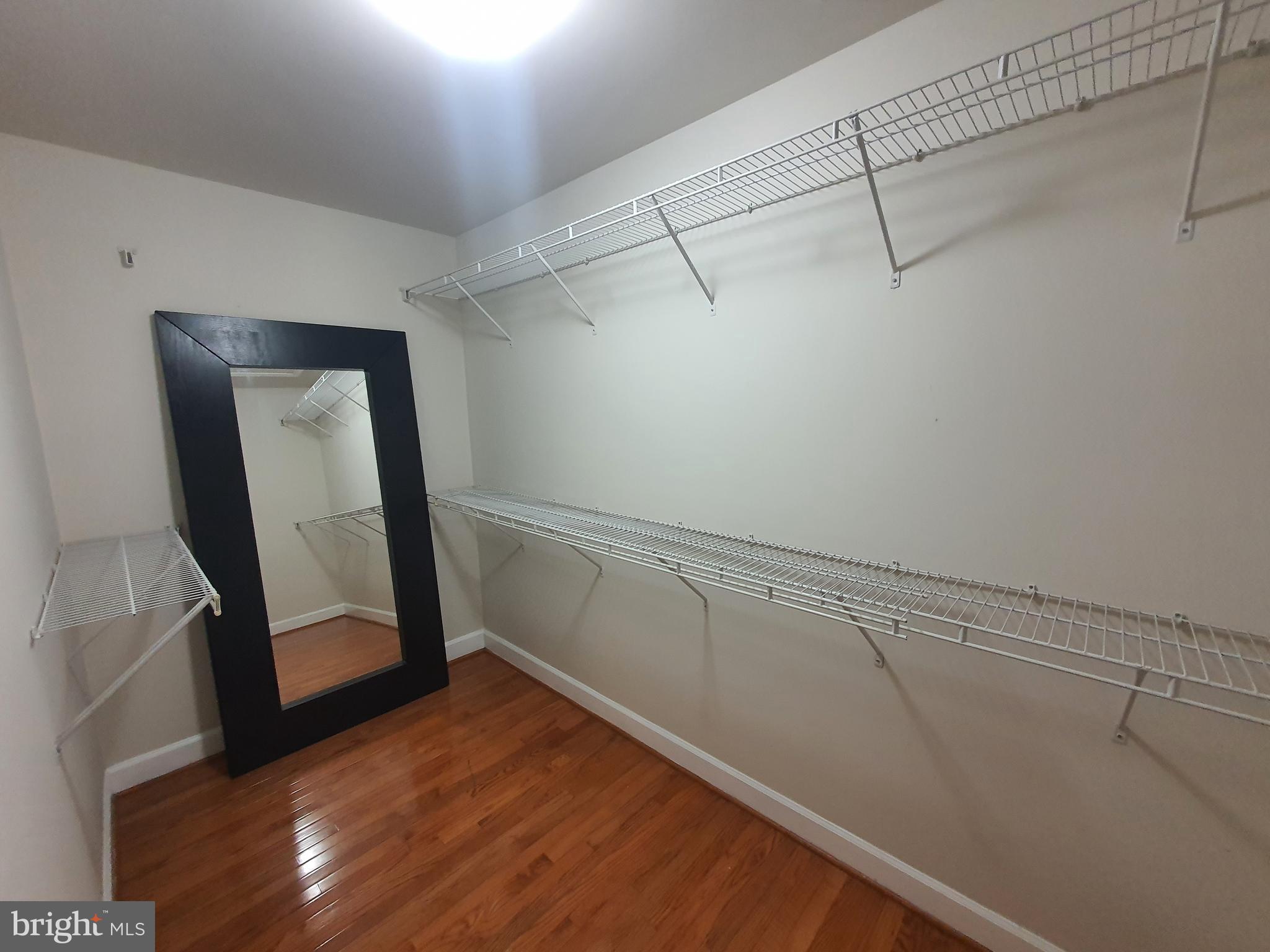 9249 Laurel Ridge Crossing Road Lorton, VA 22079 - Photo 10 of 38 a view of a room with racks on the wall