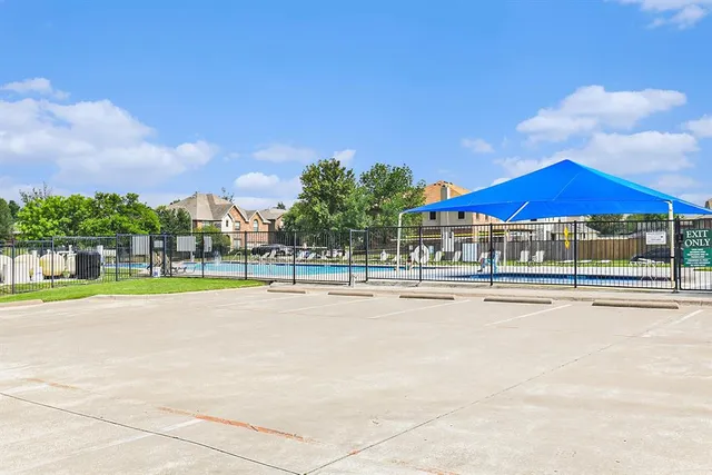 a view of an outdoor space and swimming pool