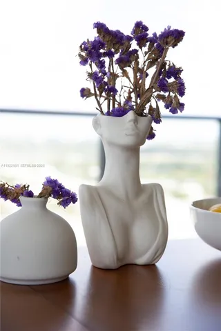 a bed room with a bed and a window