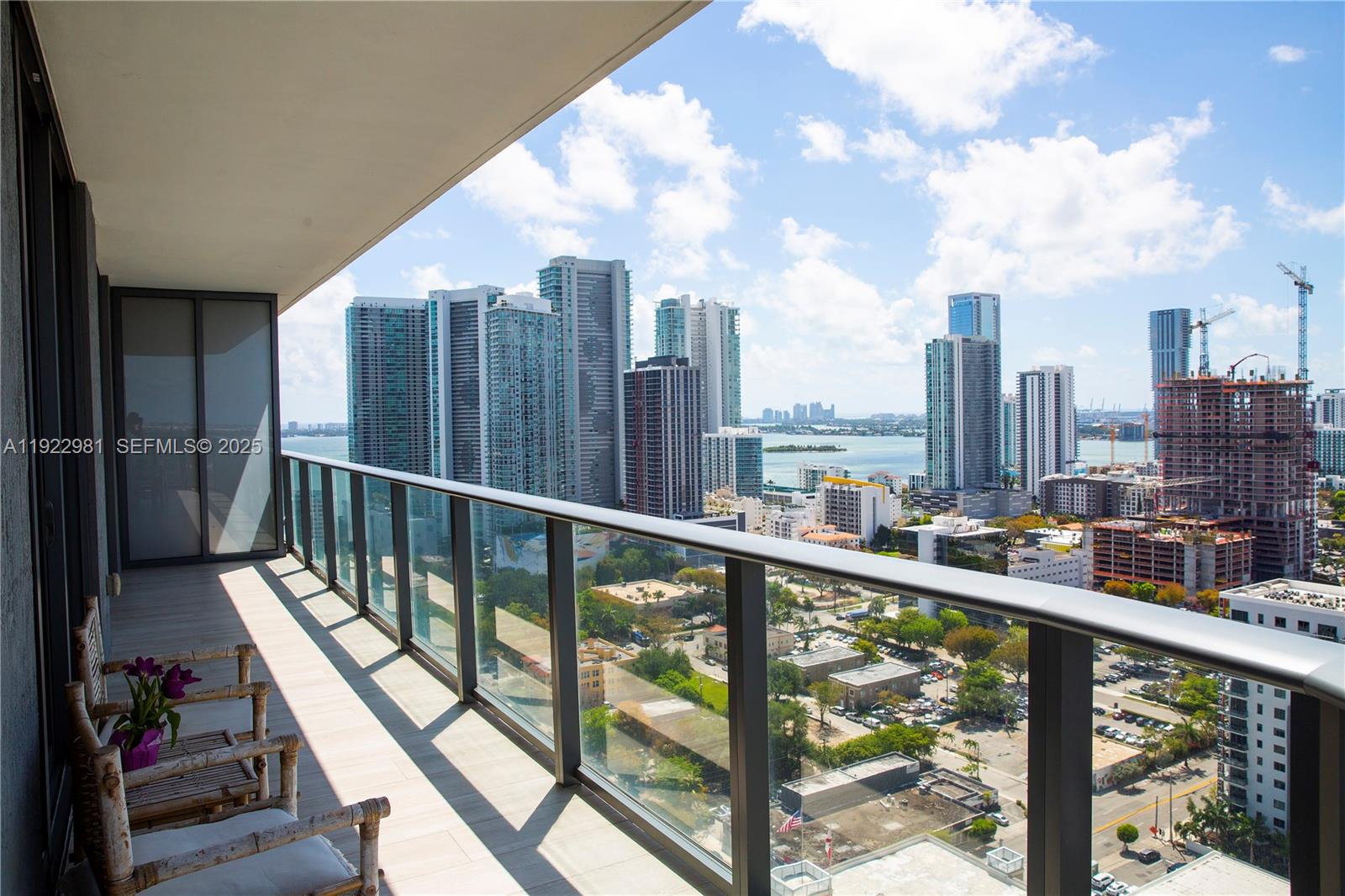 121 Northeast 34th Street, Unit 2701 Miami, FL 33137 - Photo 19 of 43 a view of city from a balcony