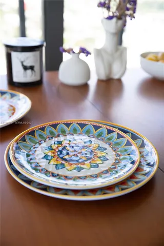 a view of a dining room with furniture