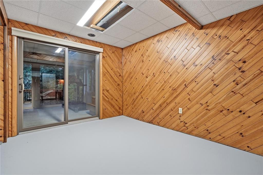 524 Beverly Road Verona, PA 15147 - Photo 23 of 45 Lower level game room with sliding doors to sunroom.