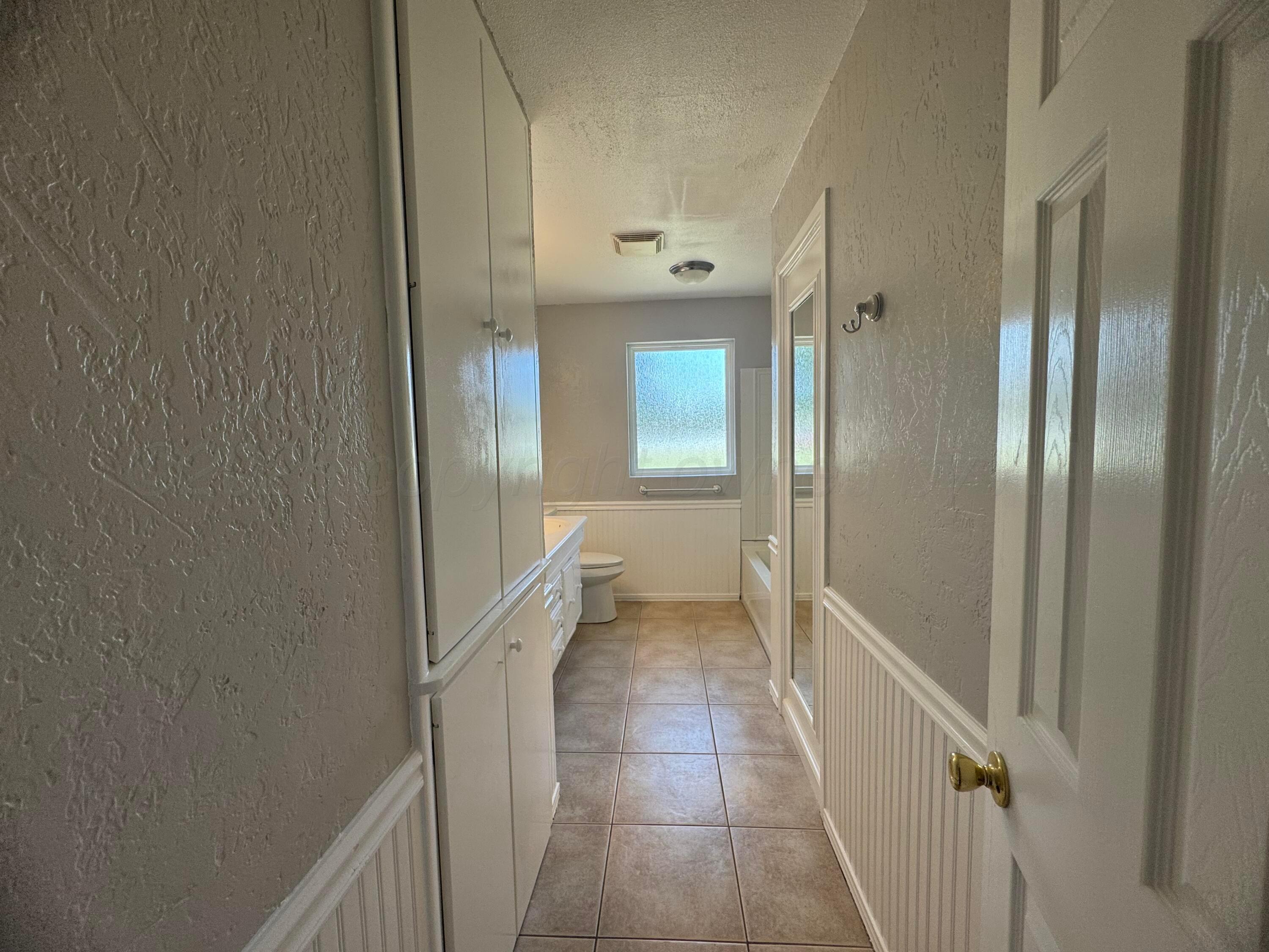 5112 Arden Road Amarillo, TX 79110 - Photo 17 of 28 a view of a hallway