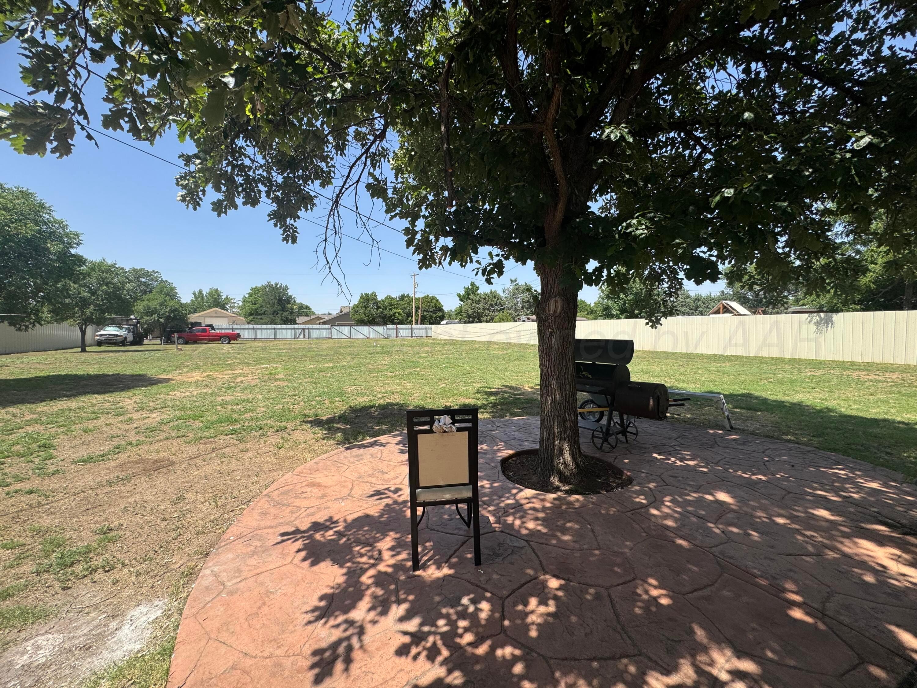 5112 Arden Road Amarillo, TX 79110 - Photo 2 of 28 a view of a lake with a yard