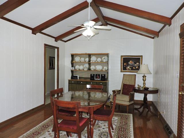 343 Kimbrough Road Clarksville, TN 37043 - Photo 7 of 30 Hardwood Floors and Beamed Ceiling Enhance the Decor of this Country Kitchen
