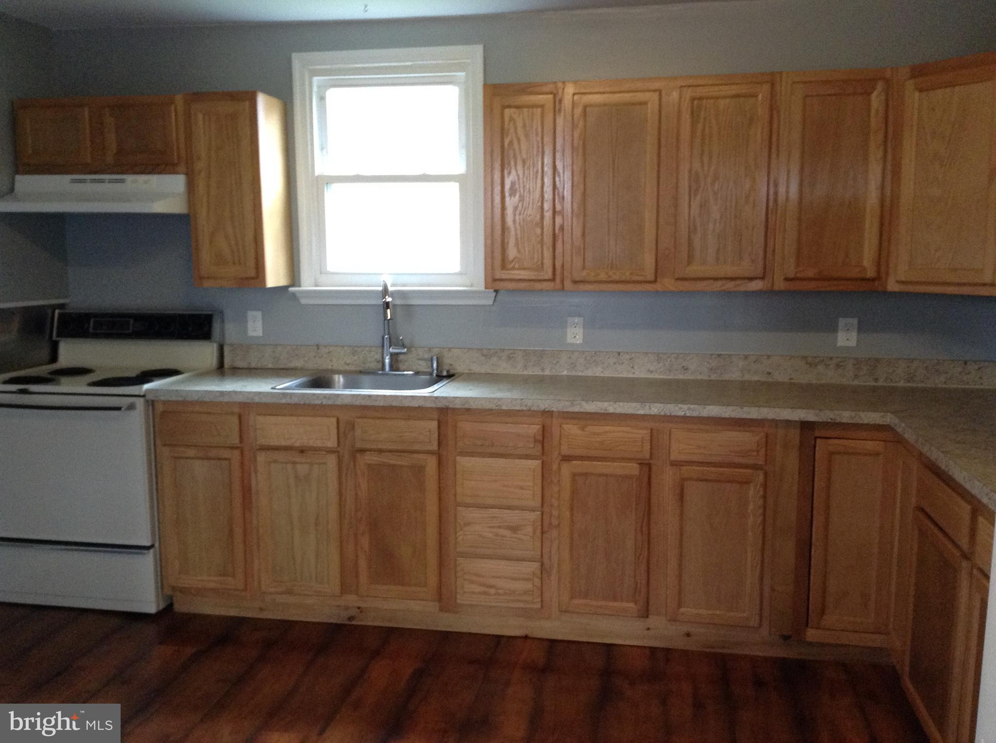 62 Kriebel Road Barto, PA 19504 - Photo 5 of 19 a kitchen with cabinets appliances and a window