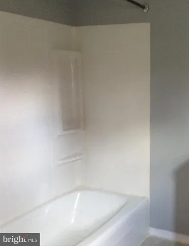 a close up of a bathtub