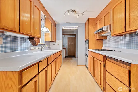 a bathroom with a sink a mirror and a bathtub