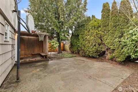 a view of a street with trees on both side of it