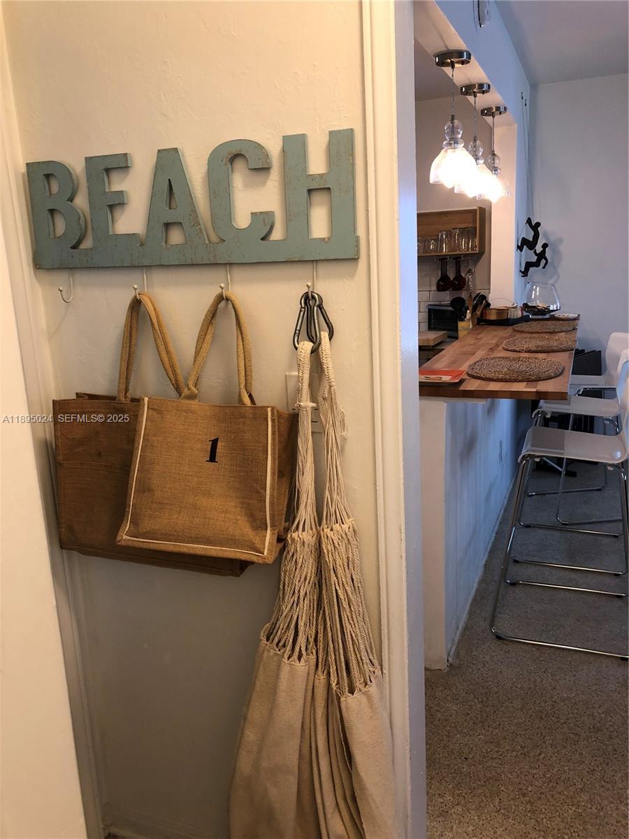 1160 Southwest 22nd Terrace, Unit 2 Miami, FL 33129 - Photo 14 of 29 a view of living room with furniture and rug