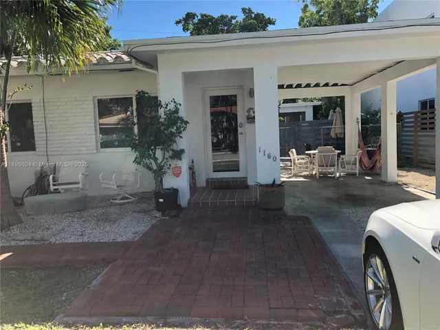 a view of a house with patio