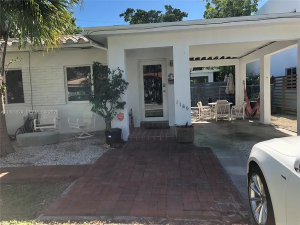 a view of a house with patio