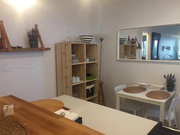 a bedroom with a bed and furniture