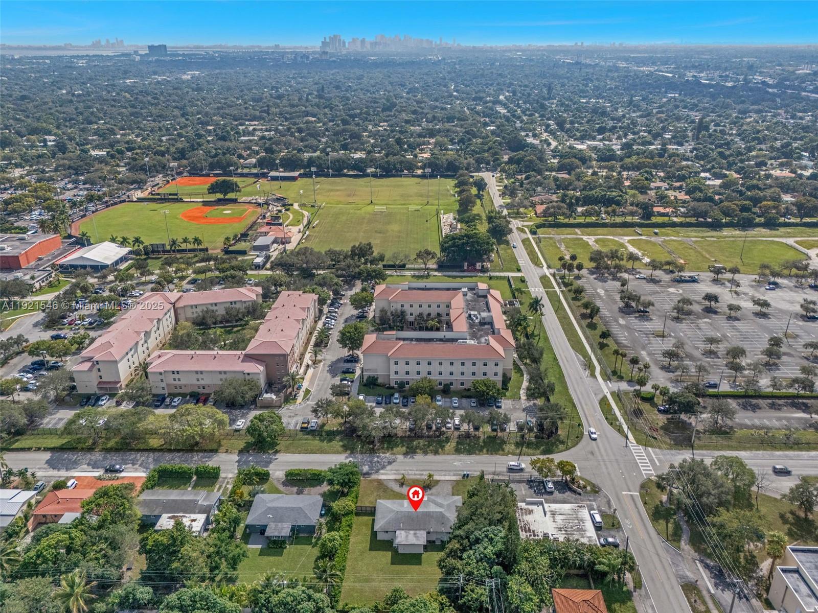 195 Northwest 115th Street Miami, FL 33168 - Photo 29 of 29 an aerial view of residential houses and lake