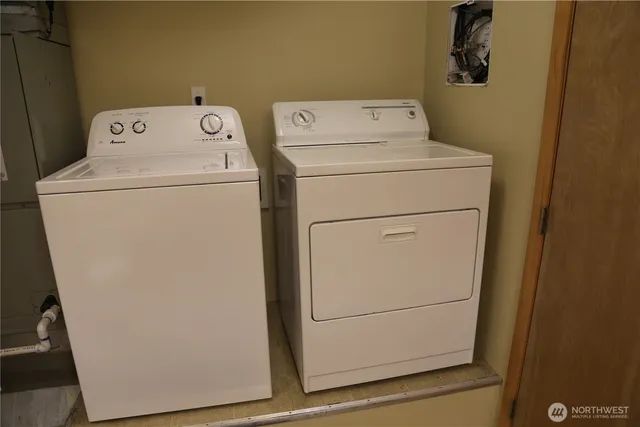 a utility room with dryer and washer