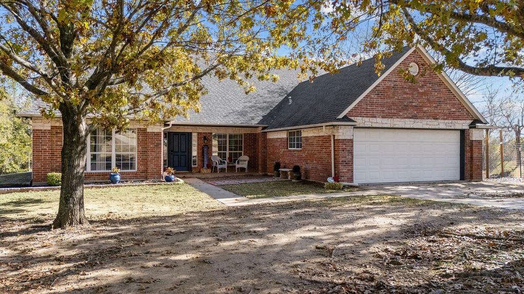 831 Union Hill Road Ennis, TX 75119 - Photo 8 of 38 a view of a house with backyard porch and sitting area