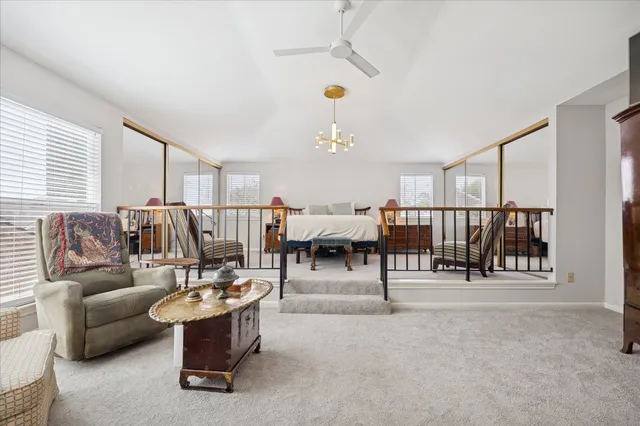 a living room with furniture and view of living room