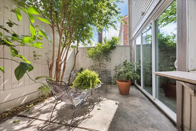 a view of a backyard with chair the garden
