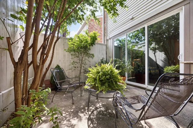 a view of backyard with patio