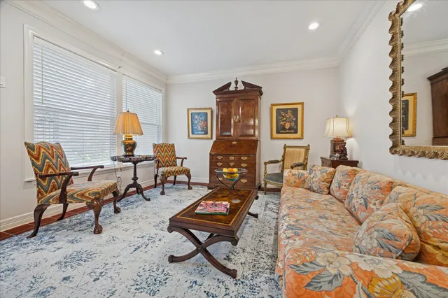 a living room with furniture and a table
