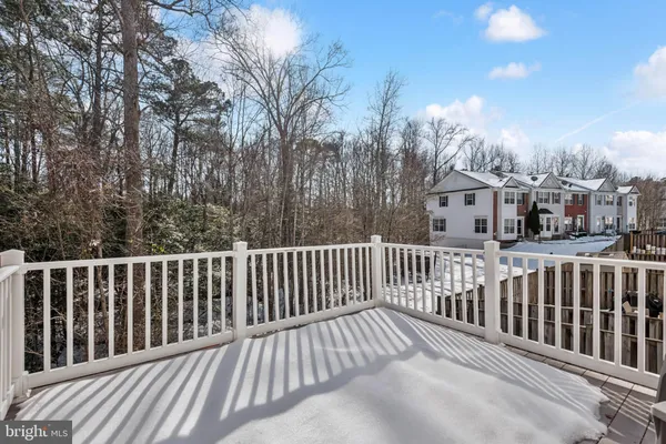 a view of a wooden roof deck