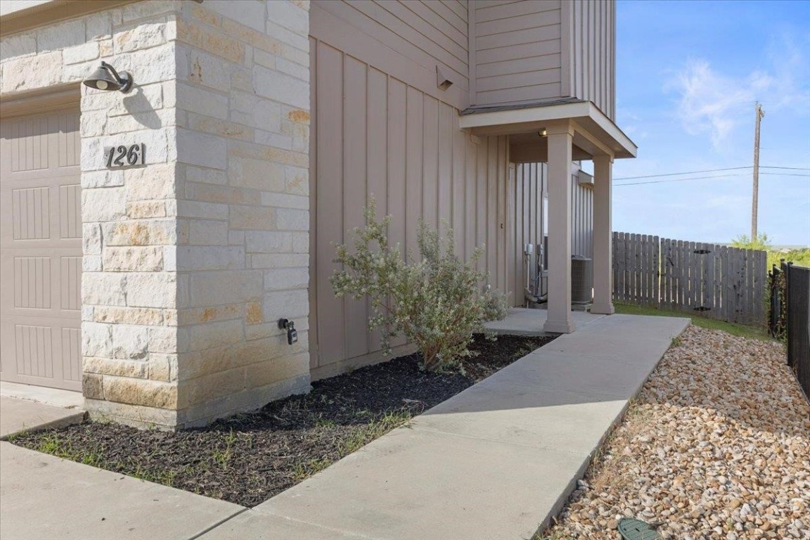 126 Dodge Road Georgetown, TX 78626 - Photo 2 of 18 a view of a wooden door and a window