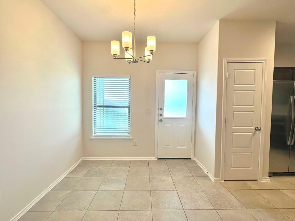 126 Dodge Road Georgetown, TX 78626 - Photo 4 of 18 a view of an empty room with window
