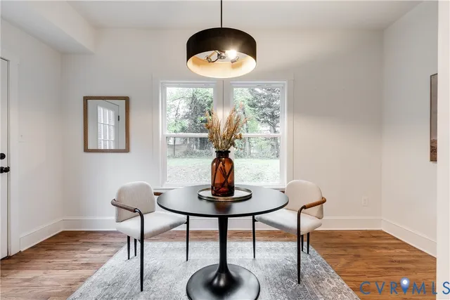 a view of a livingroom with furniture and window