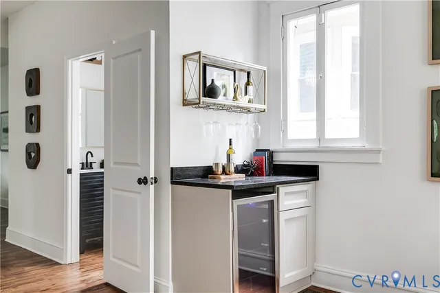a kitchen with stainless steel appliances a sink and cabinets