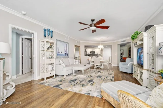 a kitchen with stainless steel appliances kitchen island granite countertop a sink and cabinets