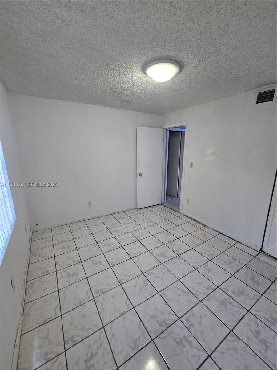 15454 Southwest 85th Lane, Unit 135 Miami, FL 33193 - Photo 12 of 17 a view of room