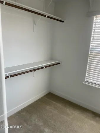 a view of a room with racks on the wall