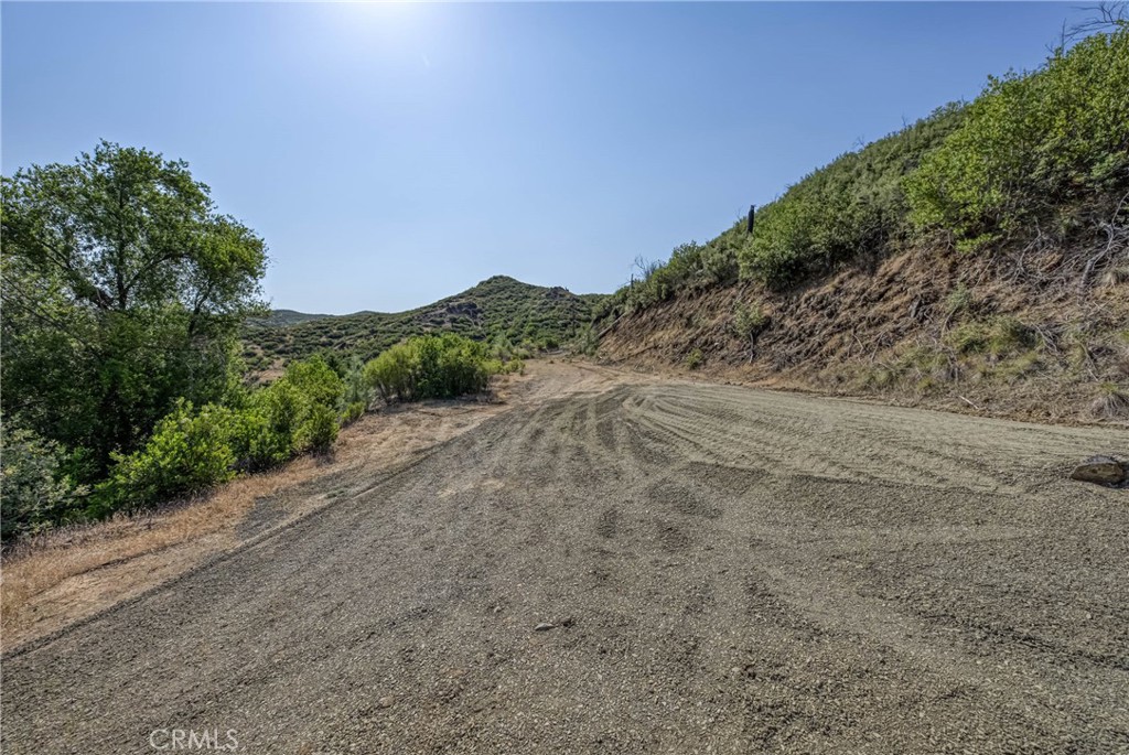 1 Butts Canyon Road Pope Valley, CA 94567 - Photo 5 of 60 a view of a road with a mountain in the background