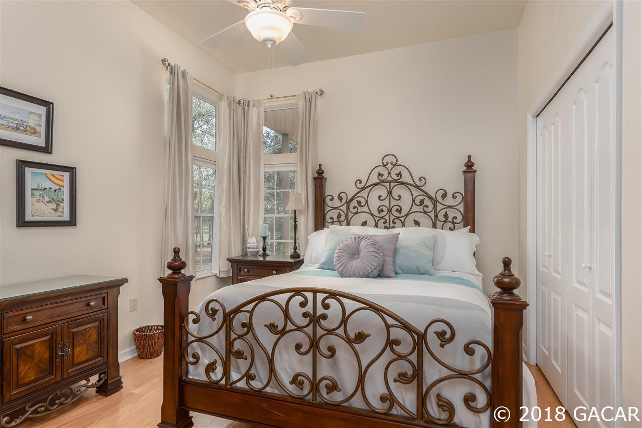 10107 Southwest 75th Way Gainesville, FL 32608 - Photo 16 of 23 Middle Bedroom