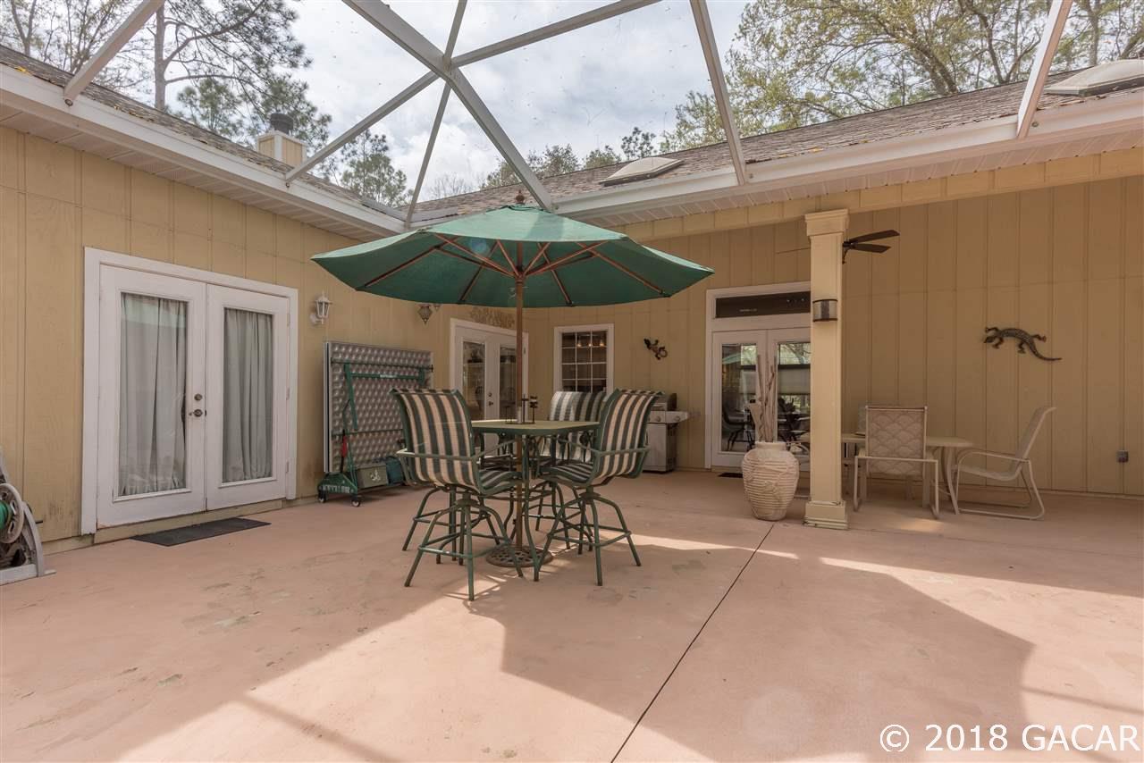 10107 Southwest 75th Way Gainesville, FL 32608 - Photo 20 of 23 Lanai viewed from Hot Tub